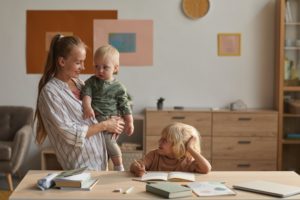 Mother with children at home